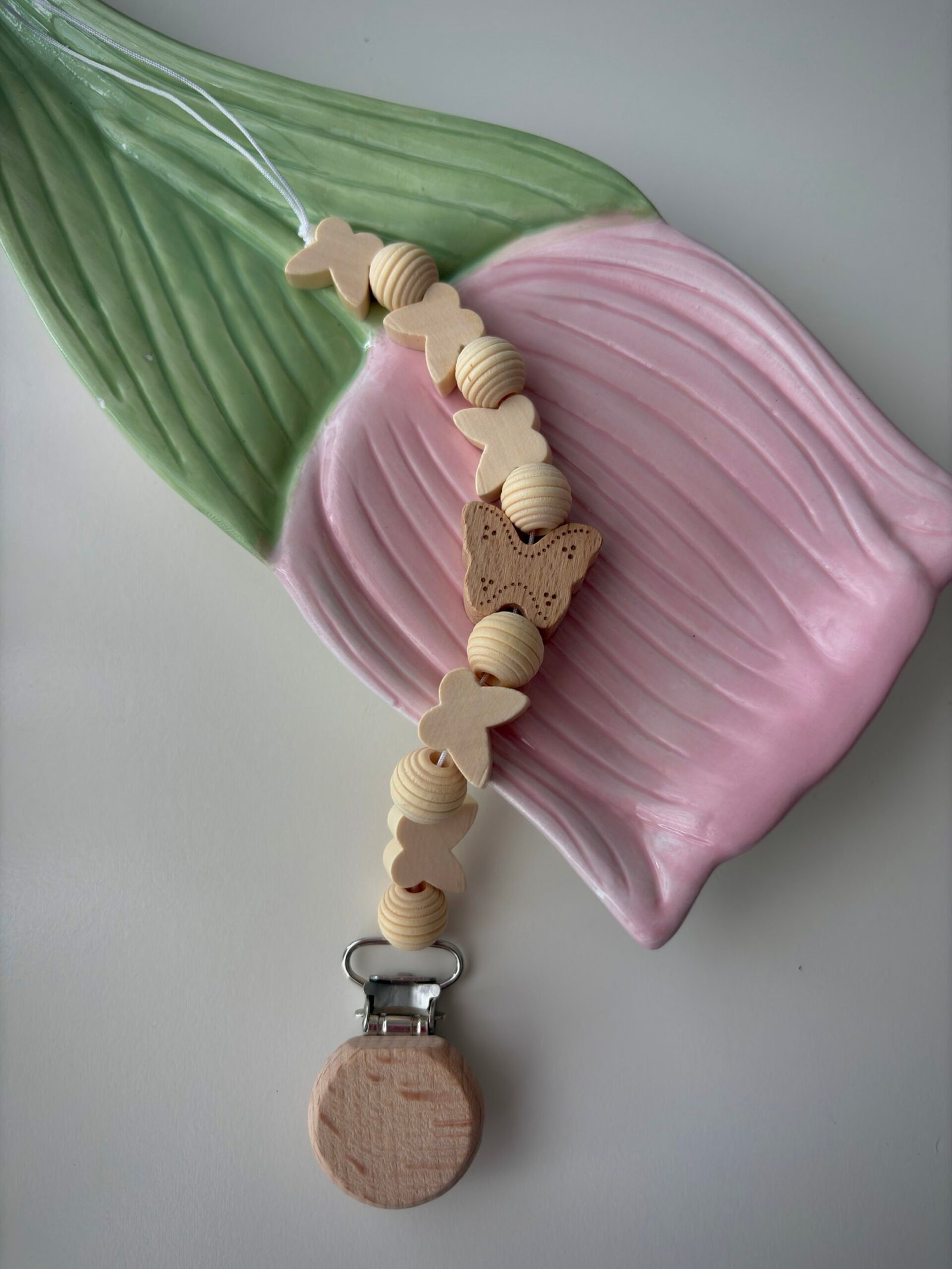 Čiulptuko laikiklis "Drugelis" Mamuli